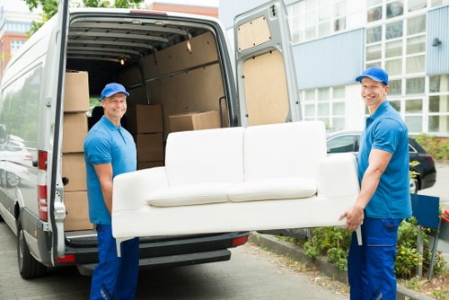 Furniture removal team handling household items in Bayswater