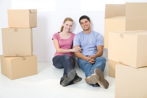 Packed office boxes and equipment prepared for a local commercial relocation