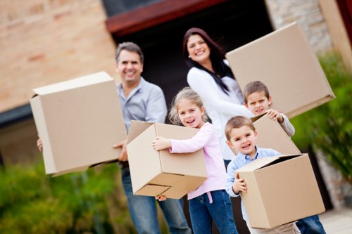 Loading household furniture into a van for a Bayswater delivery