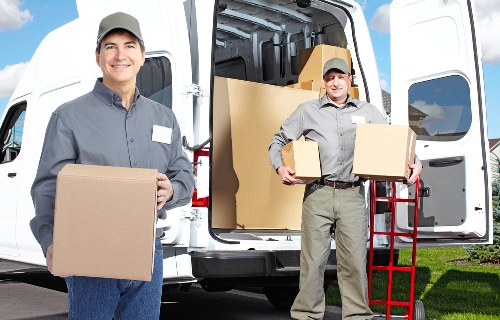 Commercial moving truck loading office and retail items in Bayswater