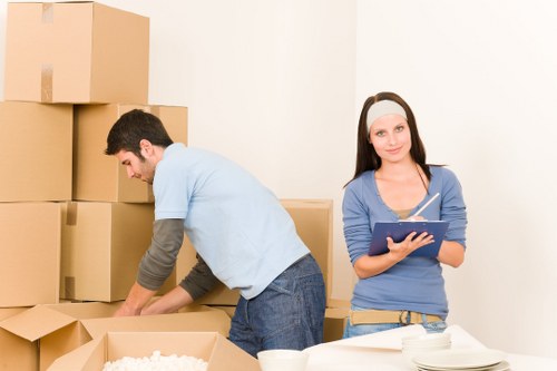 Crew handling furniture carefully during a man and van move