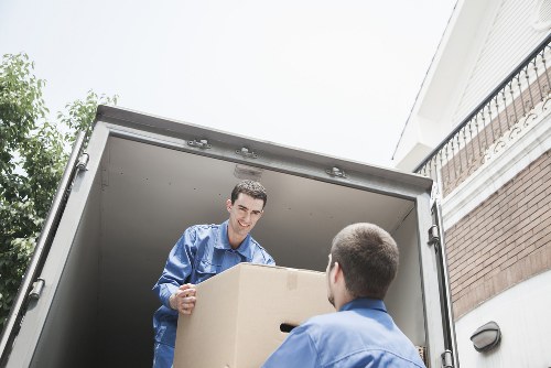 Local removal company loading a van for a move in Bayswater